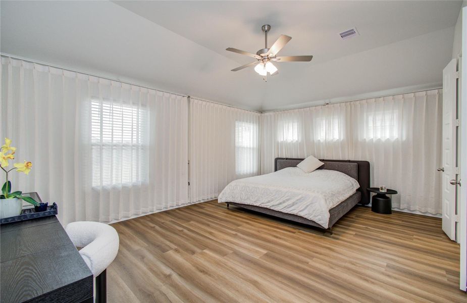 Furnished interior view inside a new home in Sunterra, Katy (Image 11).