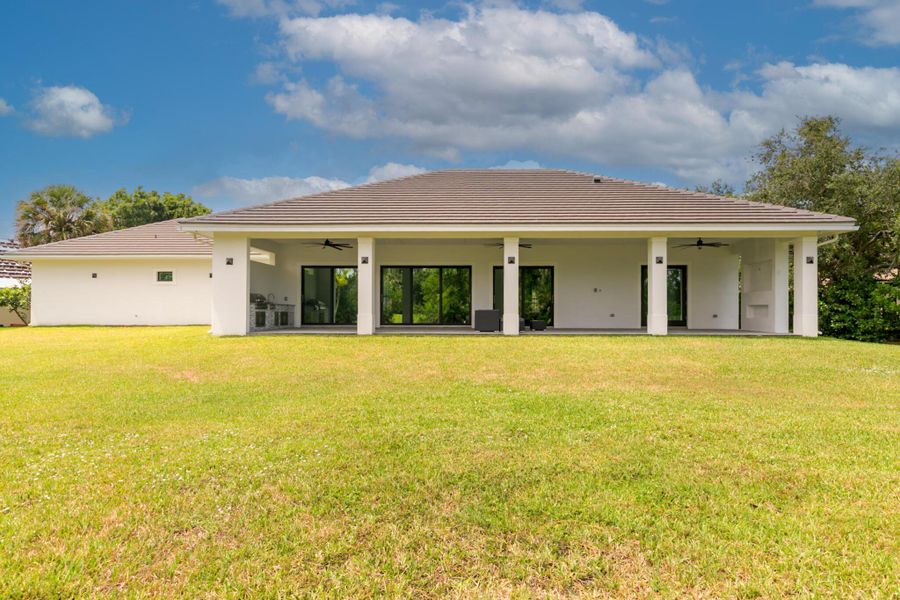 Front exterior of a new home in , Port St. Lucie, FL, highlighting curb appeal (Image 21). Front exterior of a new home in , Port St. Lucie, FL, highlighting curb appeal (Image 21).