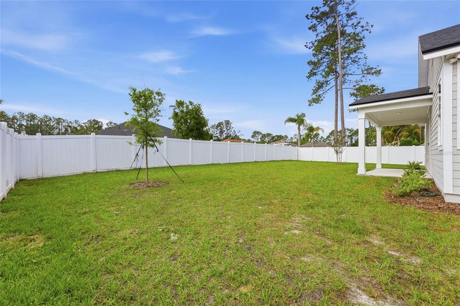 Exterior details and patio area of a home in Palm Coast Homes, Palm Coast (Image 29).