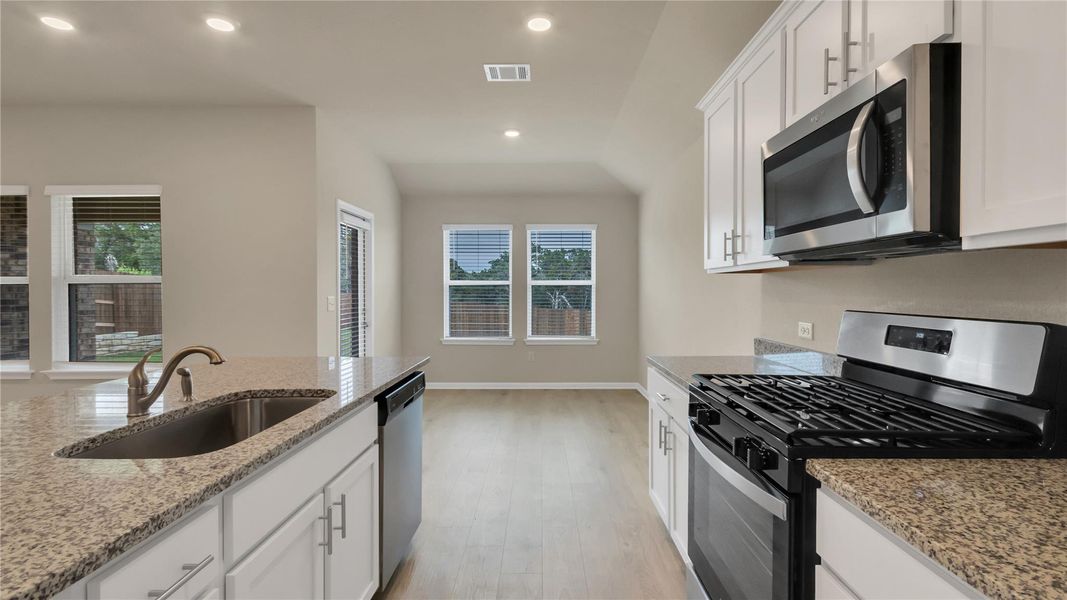 Furnished interior view inside a new home in Bar W Ranch, Leander (Image 6). Furnished interior view inside a new home in Bar W Ranch, Leander (Image 6).