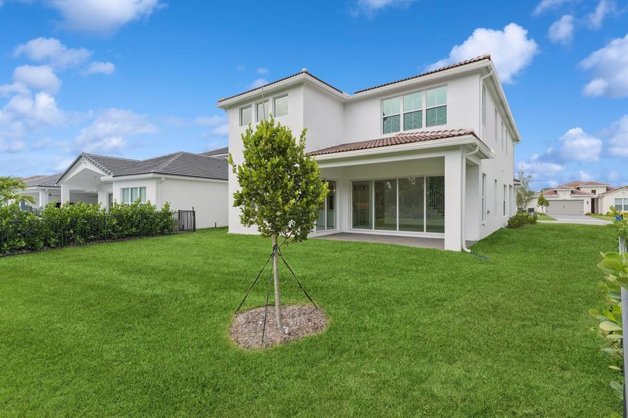 Front exterior of a new home in Salerno Reserve - Single Family, Stuart, FL, highlighting curb appeal (Image 2). Front exterior of a new home in Salerno Reserve - Single Family, Stuart, FL, highlighting curb appeal (Image 2).