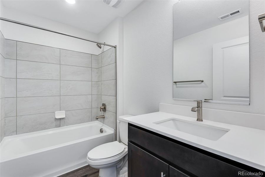 Furnished interior view inside a new home in Trails at Crowfoot, Parker (Image 6).