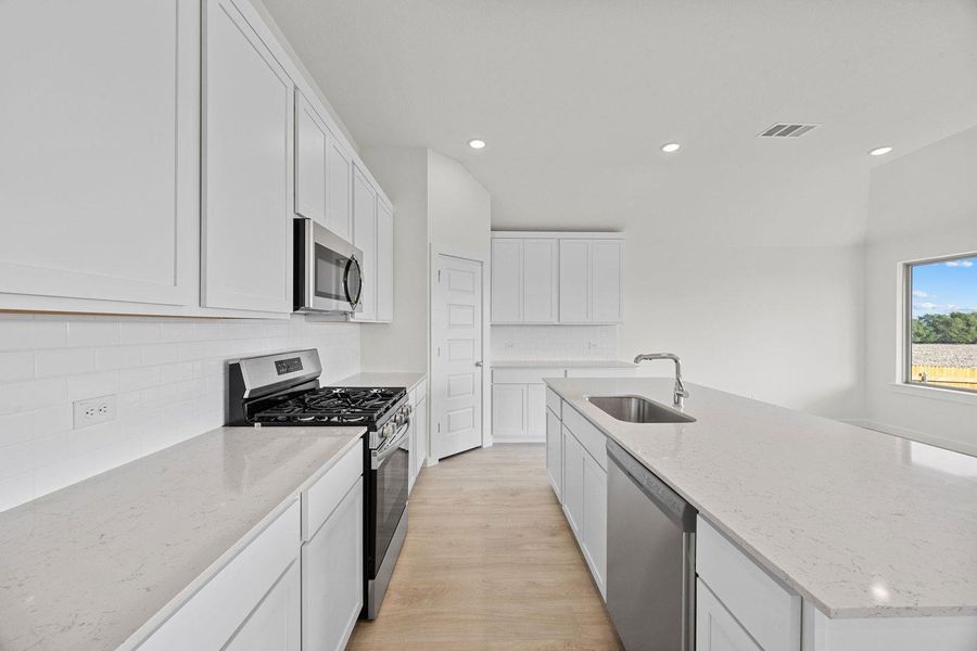 Furnished interior view inside a new home in Prairie Winds, Hutto (Image 6).