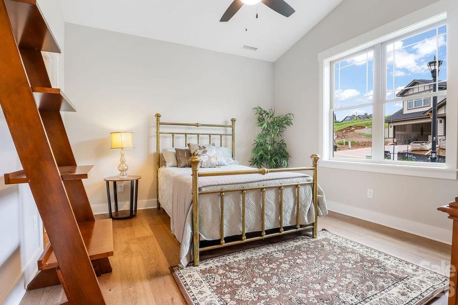 Secondary, main level bedroom easily used as a home office or flex space.