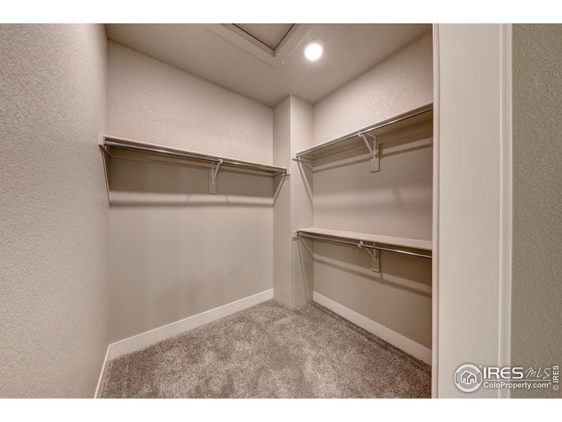 Furnished interior view inside a new home in Highlands at Fox Hill - The Flats, Longmont (Image 16).