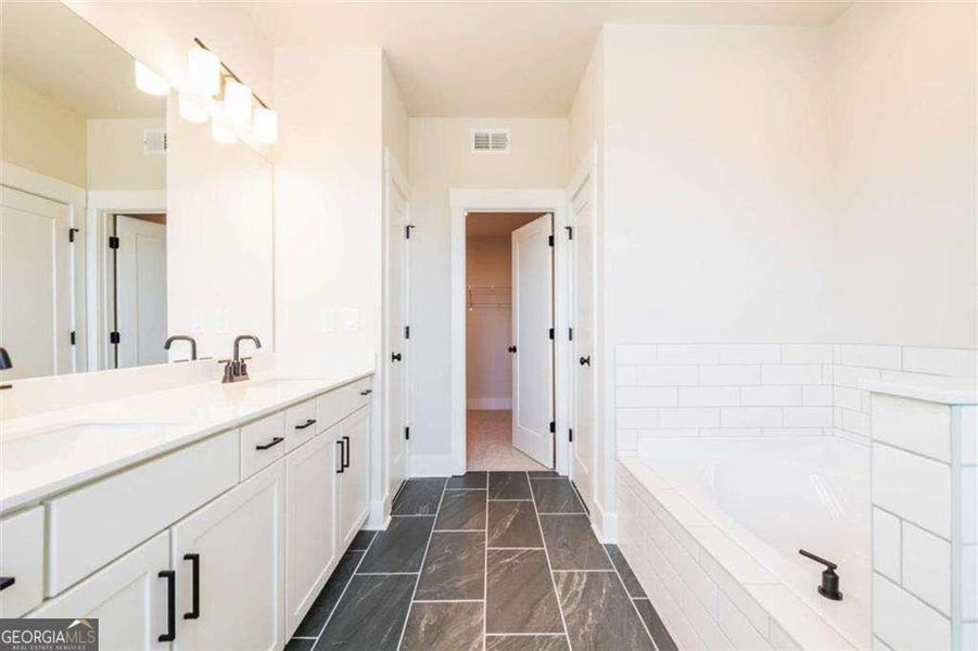 Furnished interior view inside a new home in The Paddocks at Doc Hughes, Buford (Image 14).