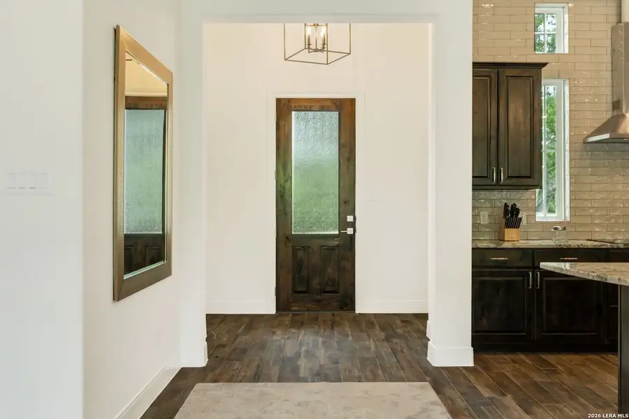 Exterior details and patio area of a home in , Fischer (Image 3).