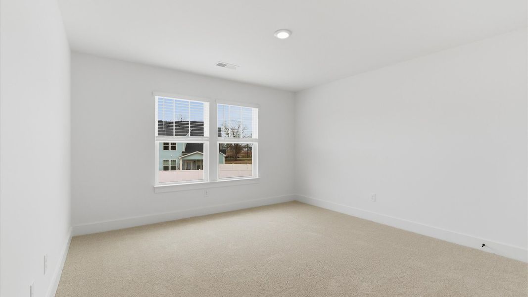 Furnished interior view inside a new home in Village at Midway, Anderson (Image 29).