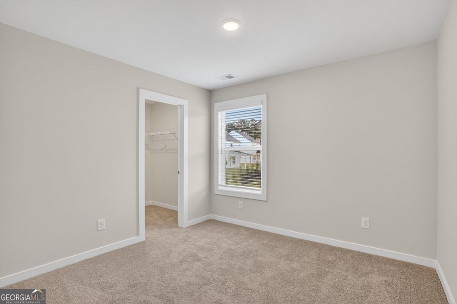 Spacious, unfurnished interior of a new home in The Fairways at Mirror Lake, Villa Rica (Image 55).