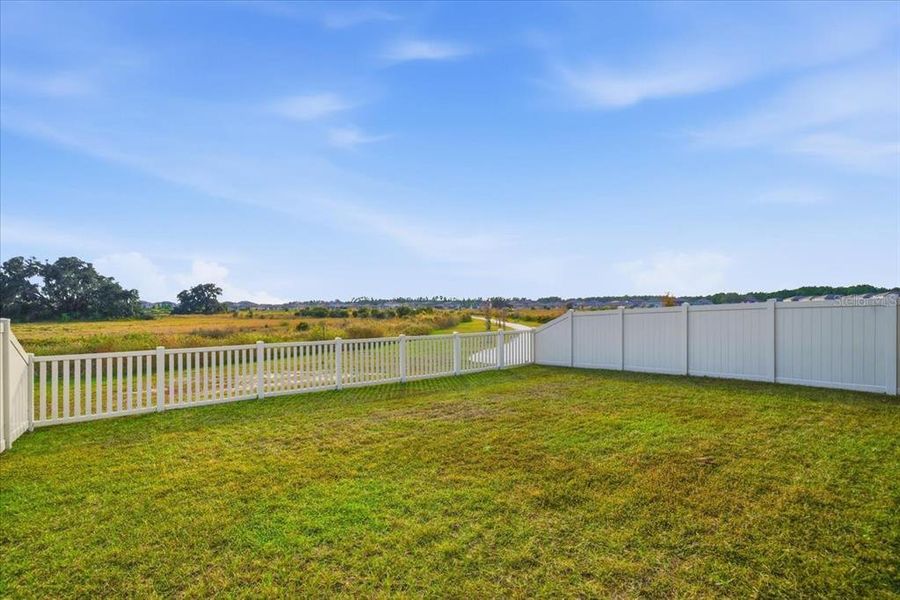 Exterior details and patio area of a home in Two Rivers: The Manors II, Zephyrhills (Image 25). Exterior details and patio area of a home in Two Rivers: The Manors II, Zephyrhills (Image 25).