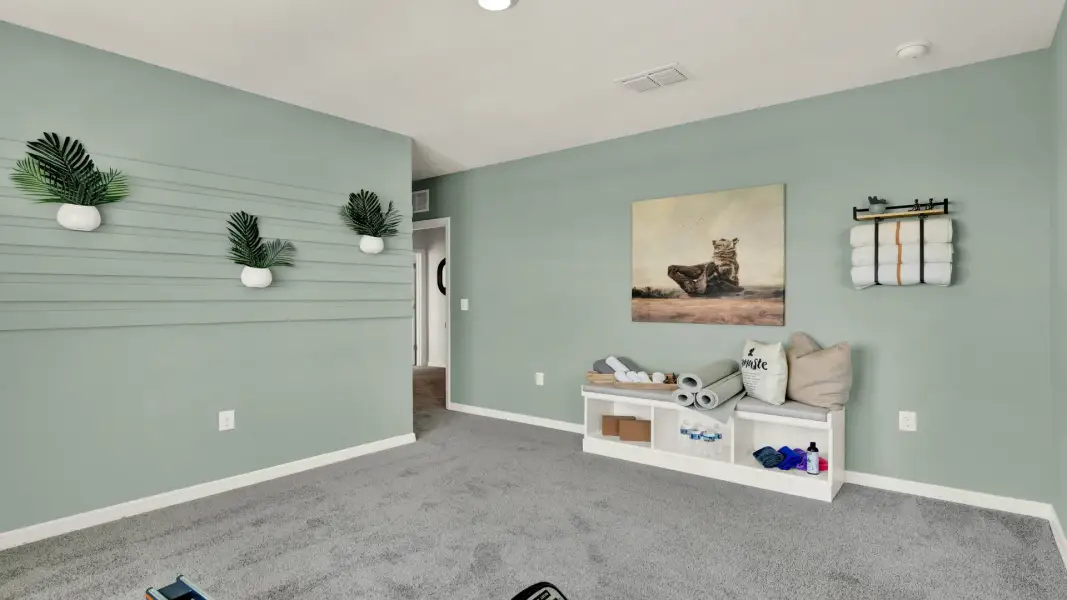 Furnished interior view inside a new home in Crossroads at Kelly Park, Apopka (Image 24).