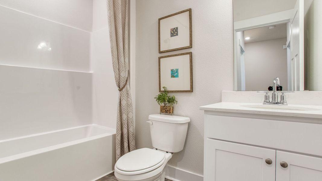 Furnished interior view inside a new home in Ashton Park Phase III, Freeport (Image 6).