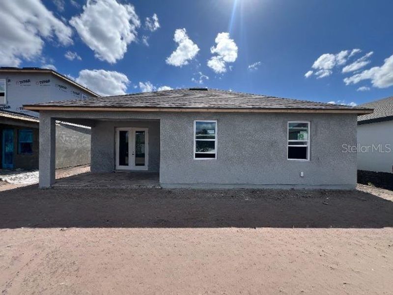 Exterior details and patio area of a home in Sunbrooke, St. Cloud (Image 2).