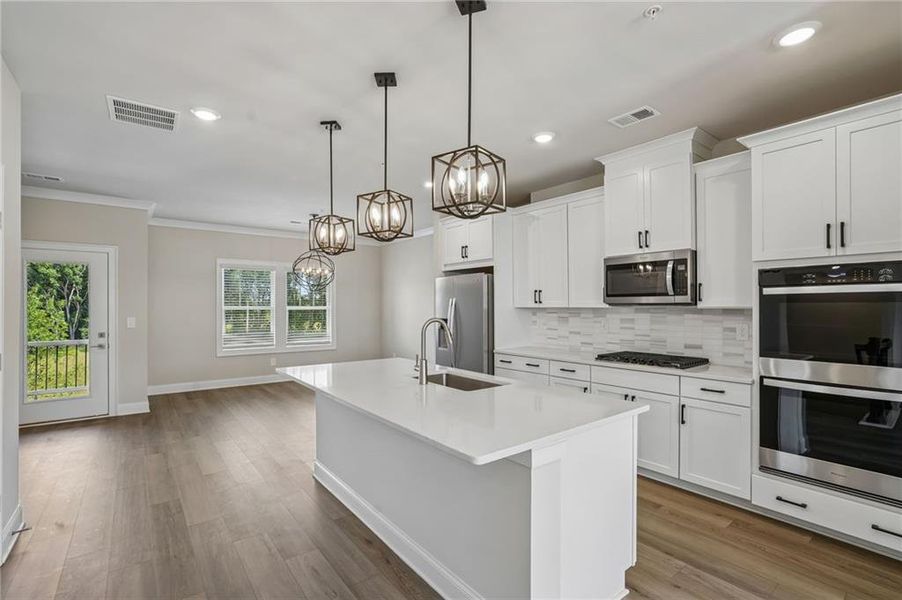 Furnished interior view inside a new home in Hemingway - Highland Series, Cumming (Image 13). Furnished interior view inside a new home in Hemingway - Highland Series, Cumming (Image 13).