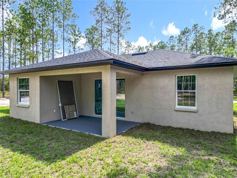 Front exterior of a new home in , Citrus Springs, FL, highlighting curb appeal (Image 22).
