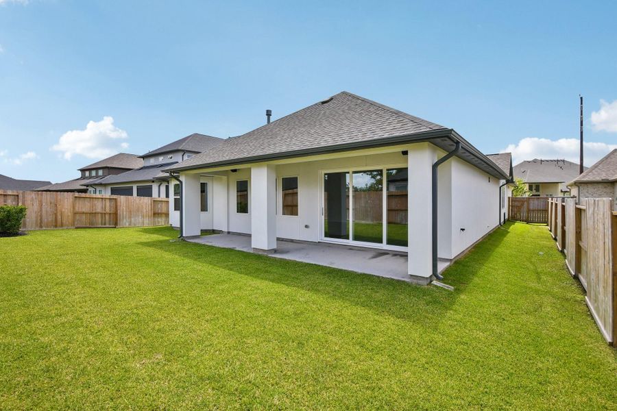 Exterior details and patio area of a home in Sienna 65', Missouri City (Image 29).