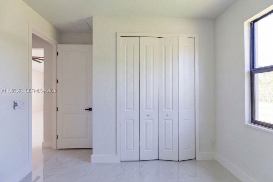 Spacious, unfurnished interior of a new home in , Lehigh Acres (Image 40).