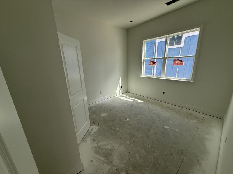 Spacious, unfurnished interior of a new home in The Domus Collection at Midtown Nexton, Summerville (Image 19).