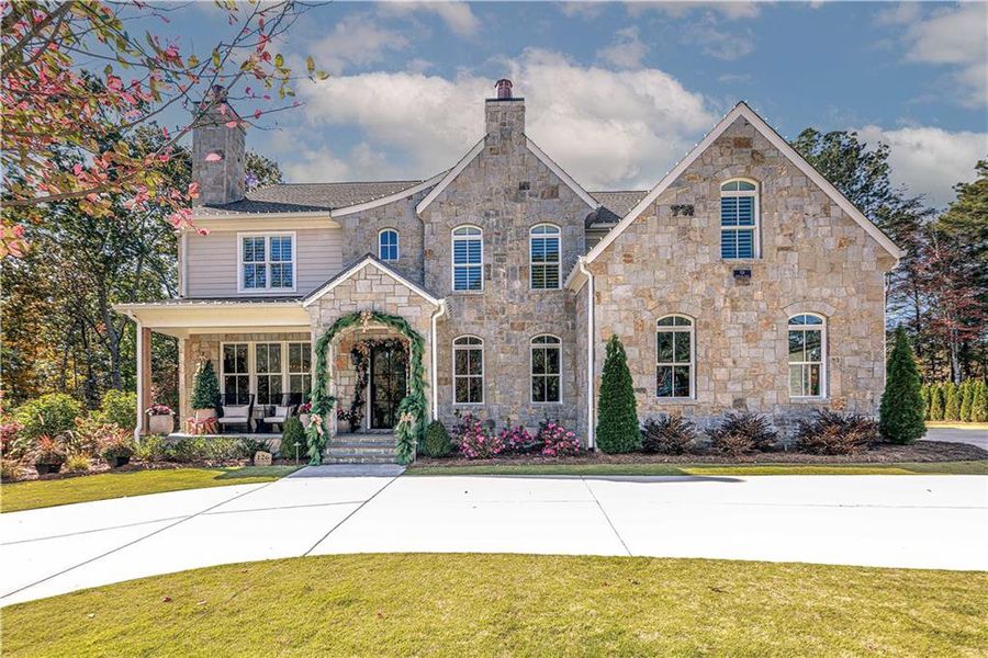 Front exterior of a new home in , Canton, GA, highlighting curb appeal (Image 1). Front exterior of a new home in , Canton, GA, highlighting curb appeal (Image 1).