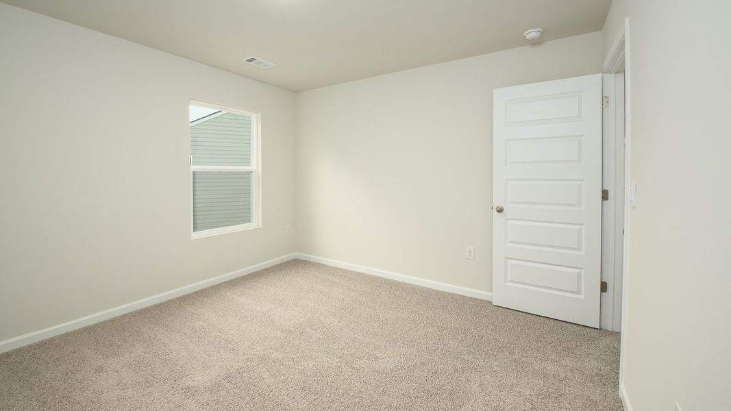 Spacious, unfurnished interior of a new home in Brooks Station, Dacula (Image 28).