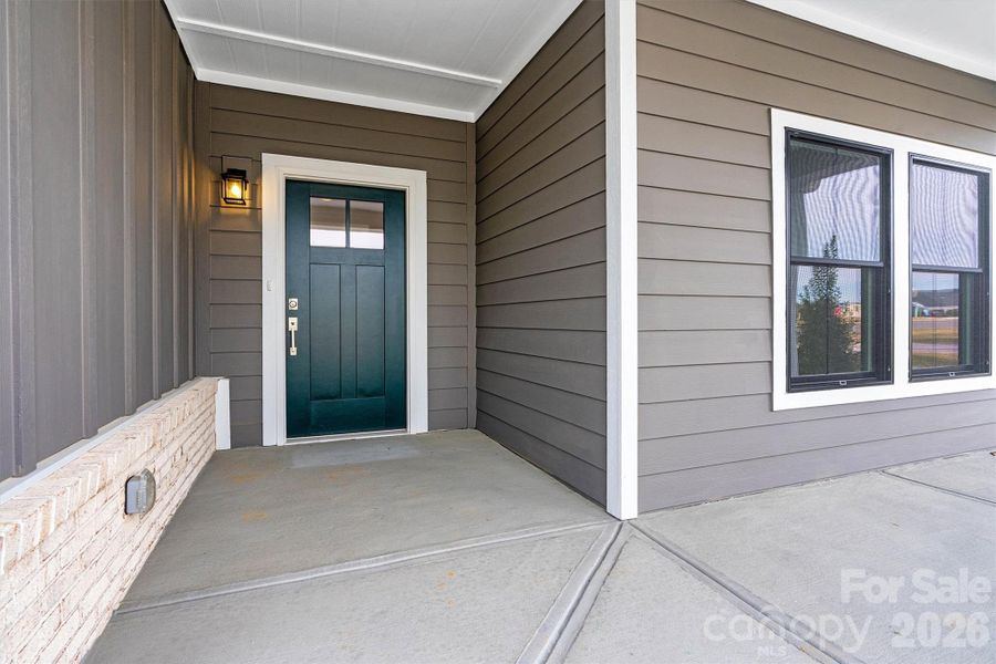 Exterior details and patio area of a home in The Courtyards at Lake Davidson, Mooresville (Image 27).