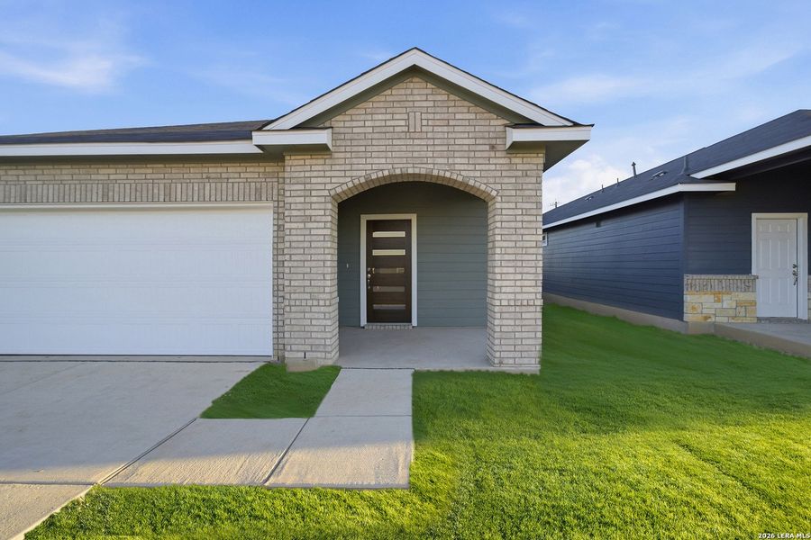 Exterior details and patio area of a home in Garden Grove, San Antonio (Image 2).