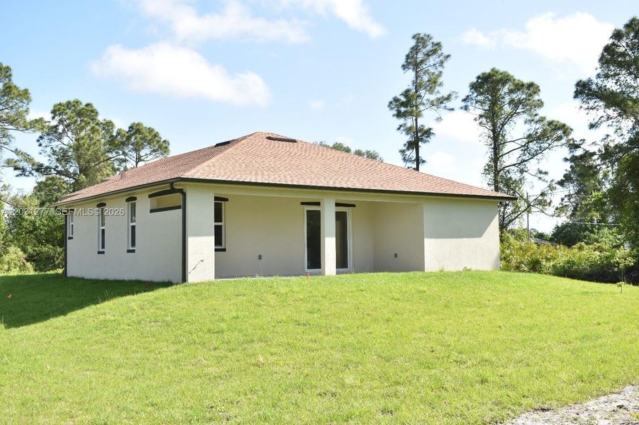 Exterior details and patio area of a home in , Lehigh Acres (Image 11).
