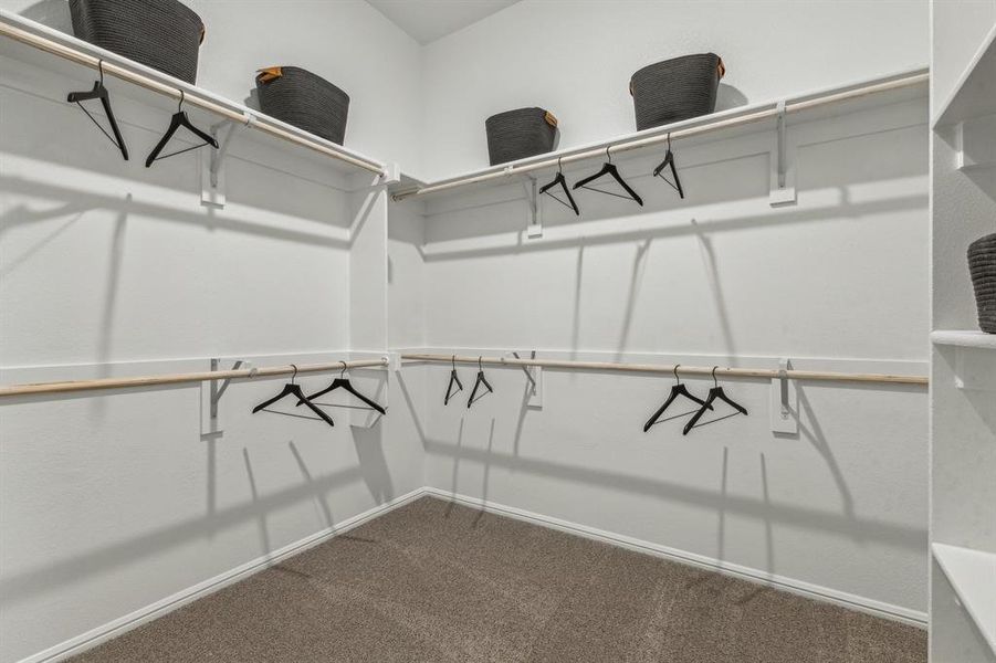 Primary Closet in the Turquoise home plan by Trophy Signature Homes – REPRESENTATIVE PHOTO Primary Closet in the Turquoise home plan by Trophy Signature Homes – REPRESENTATIVE PHOTO