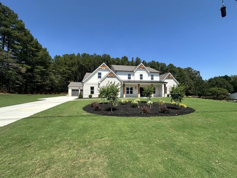 Front exterior of a new home in , Lawrenceville, GA, highlighting curb appeal (Image 19). Front exterior of a new home in , Lawrenceville, GA, highlighting curb appeal (Image 19).