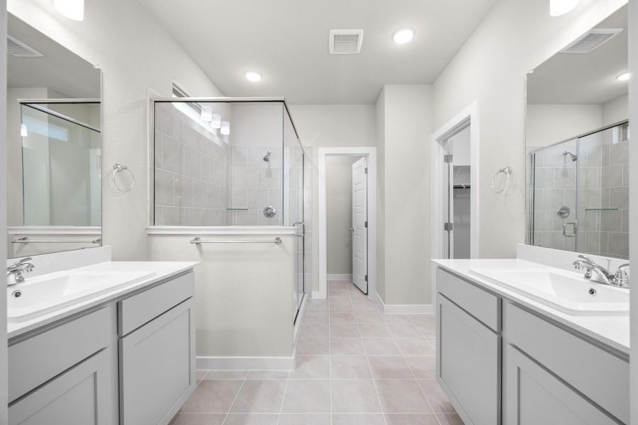 Primary Bath in the Elm home plan by Trophy Signature Homes – REPRESENTATIVE PHOTO Primary Bath in the Elm home plan by Trophy Signature Homes – REPRESENTATIVE PHOTO