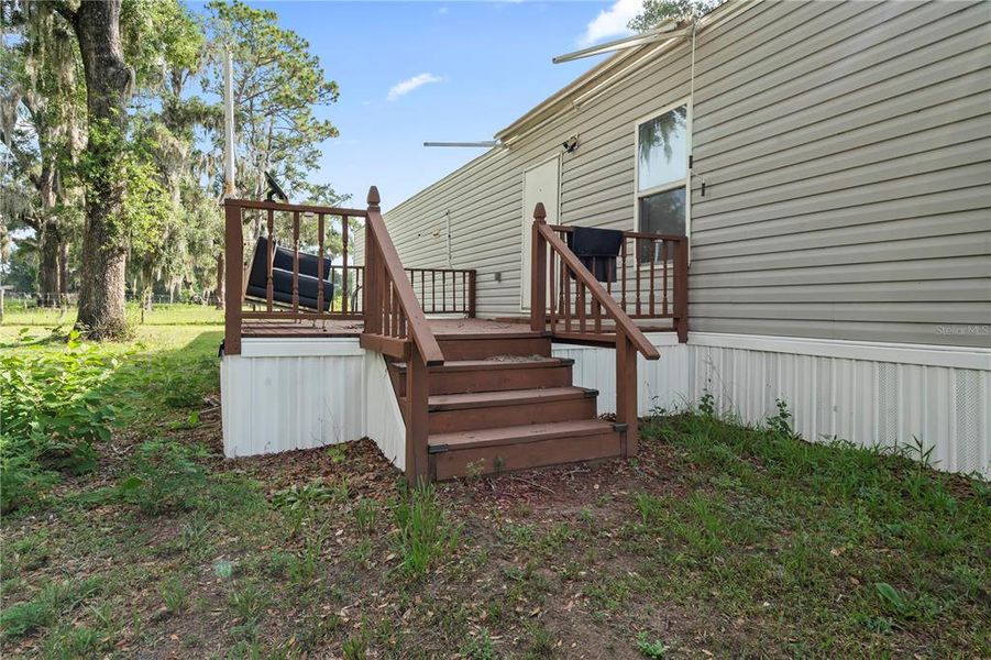 Exterior details and patio area of a home in , Dade City (Image 8).