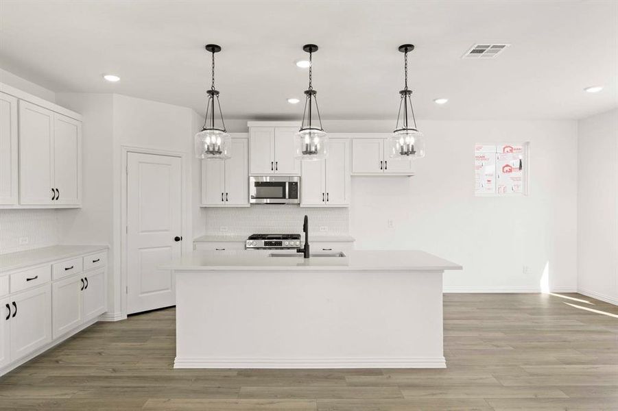 Furnished interior view inside a new home in Creekview Fossil Ridge, Pilot Point (Image 7).
