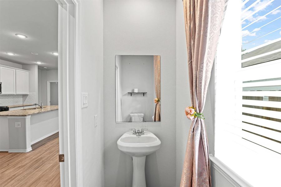 Furnished interior view inside a new home in Liberty Collection at Fairway Farms, Tomball (Image 9).