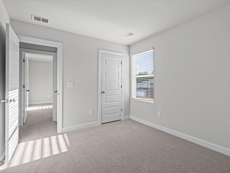 Spacious, unfurnished interior of a new home in Brayfield Manor - Heritage Collection, Wellford (Image 19).