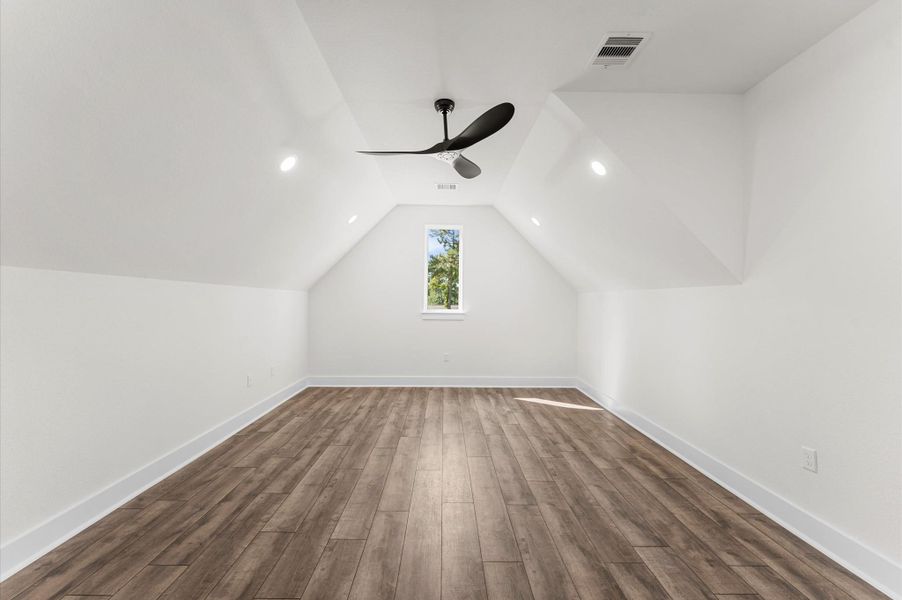 Expansive upstairs suite with full bath and walk-in closet—ideal as a fourth bedroom, media room, or guest retreat. Expansive upstairs suite with full bath and walk-in closet—ideal as a fourth bedroom, media room, or guest retreat.