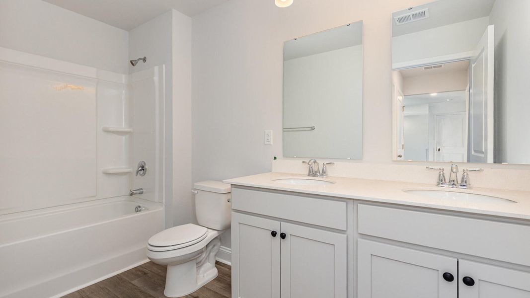 Furnished interior view inside a new home in The Ranch, Holly Hill (Image 8).