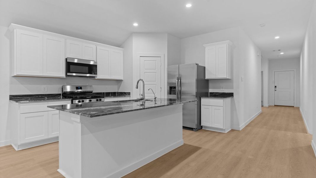 Furnished interior view inside a new home in Caldwell Crossing, Iowa Colony (Image 3).