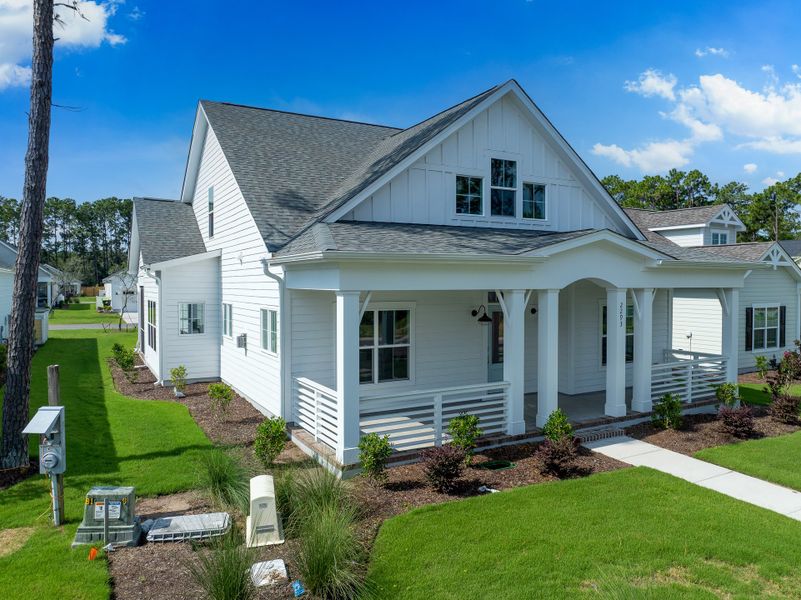 Front exterior of a new home in Osprey Landing, Southport, NC, highlighting curb appeal (Image 24).