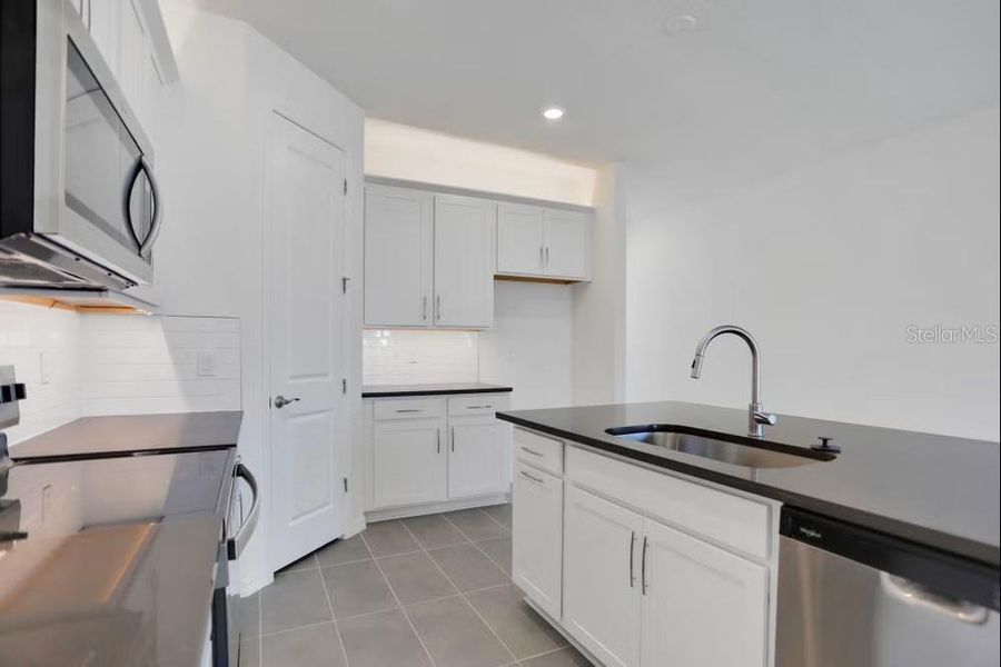 Furnished interior view inside a new home in Turnleaf, Punta Gorda (Image 8).