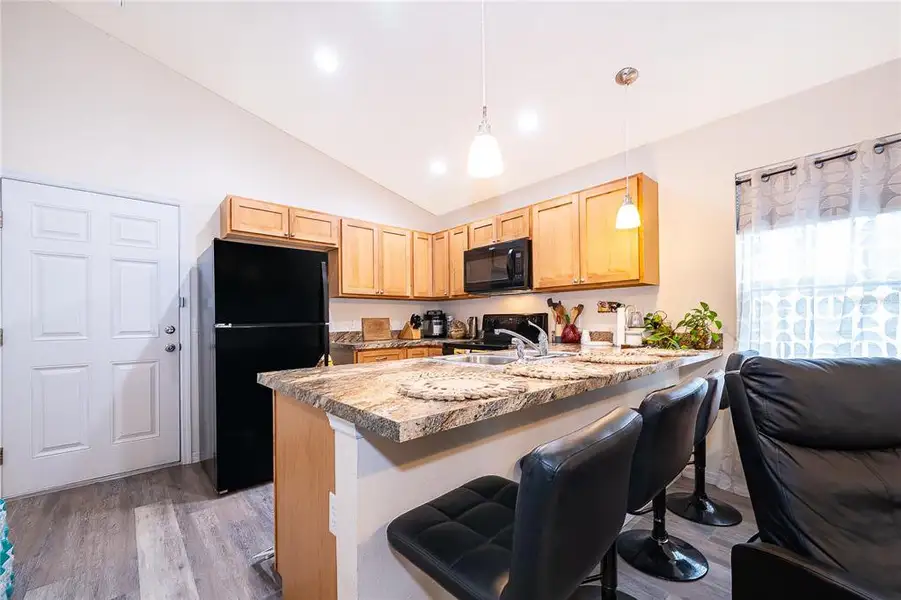 Furnished interior view inside a new home in , Tavares (Image 12).