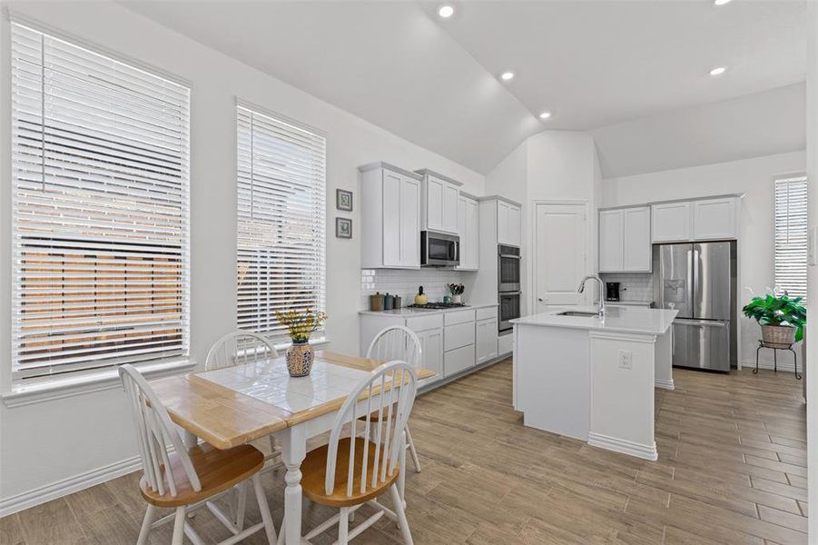 Breakfast rooms with windows to backyard Breakfast rooms with windows to backyard