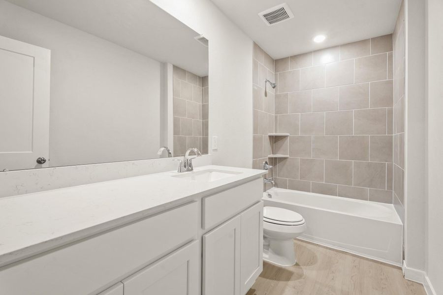 Furnished interior view inside a new home in Trails at Woodhaven, La Marque (Image 11).