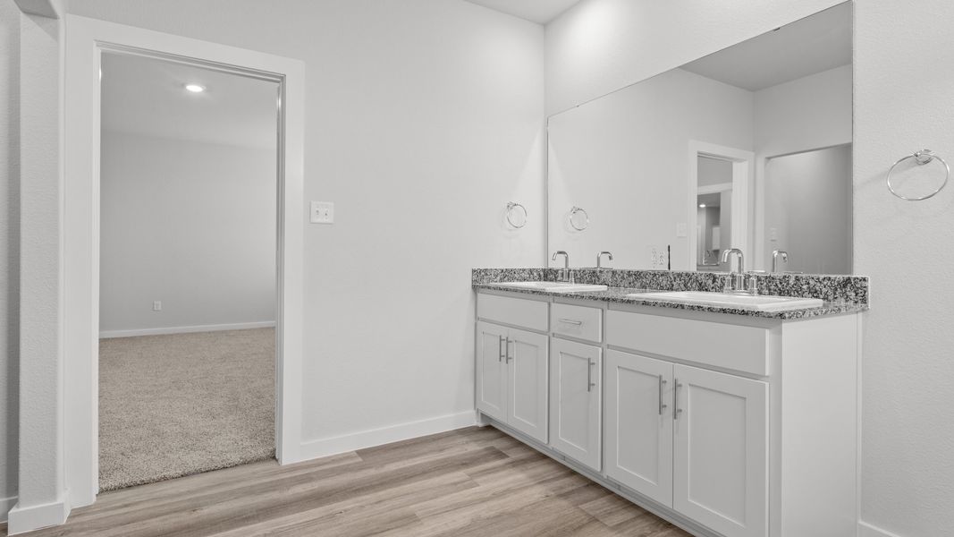 Representative furnished interior of a home built from the LAKE FORT by D.R. Horton in Heritage Parks, Abilene (Image 11).