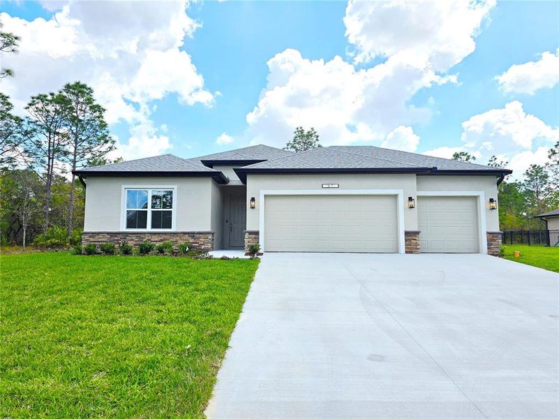 Front exterior of a new home in , Homosassa, FL, highlighting curb appeal (Image 32).