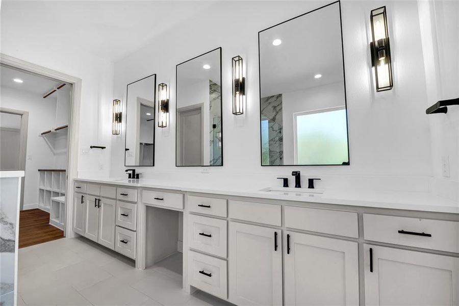 Bathroom featuring vanity and hardwood / wood-style flooring