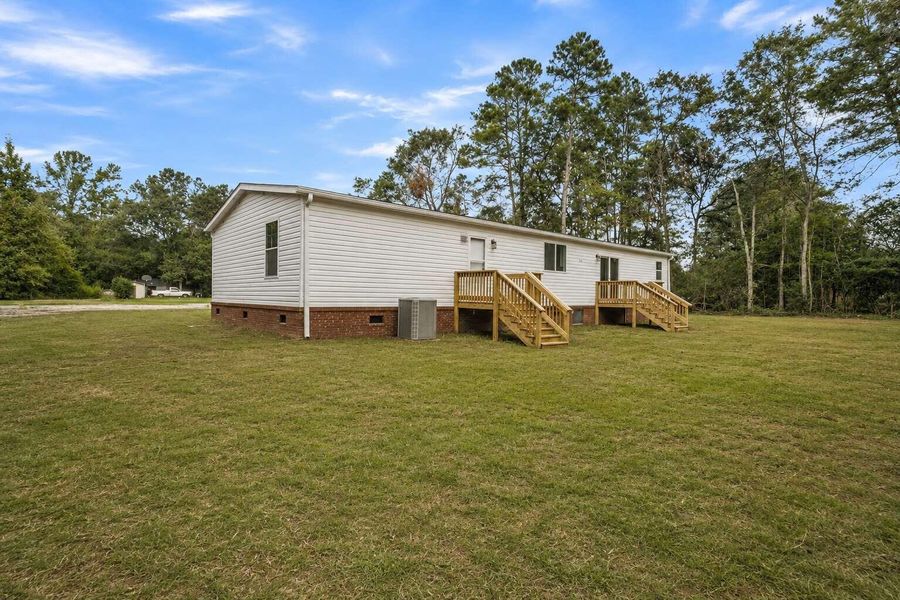 Exterior details and patio area of a home in , Holly Hill (Image 22).