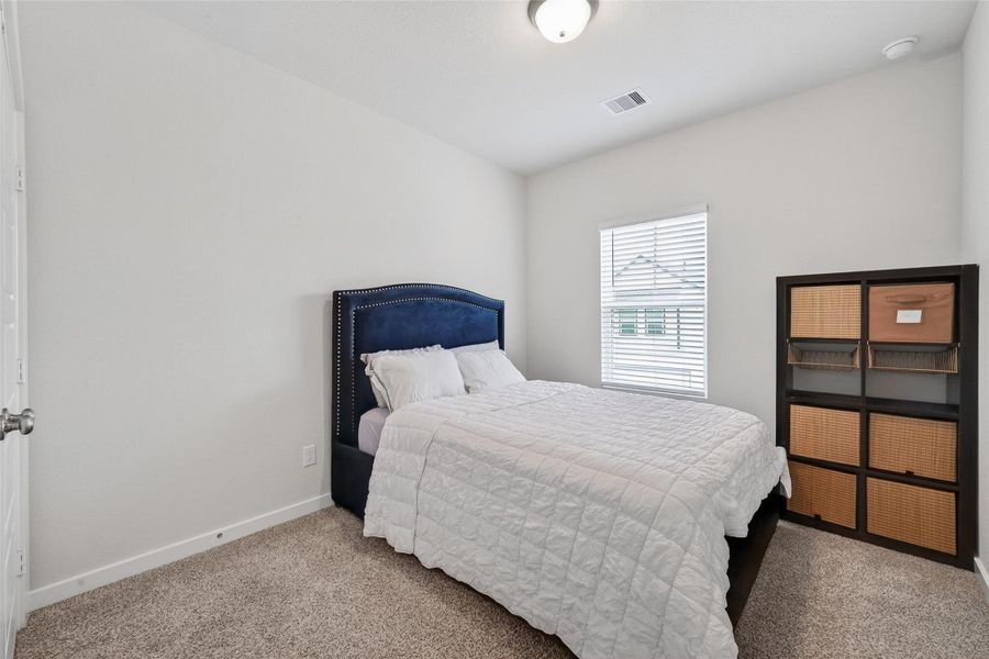 Furnished interior view inside a new home in McClendon Park Village, Houston (Image 10).