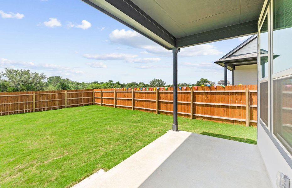 Exterior details and patio area of a home in Saddleback at Santa Rita Ranch, Liberty Hill (Image 3).