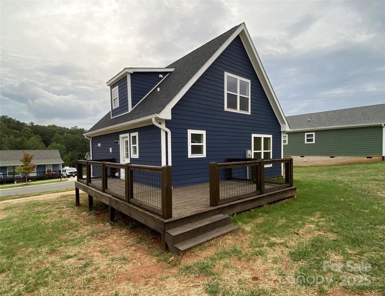 BACK VIEW SHOWING WRAP-AROUND DECK