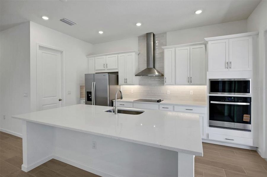 Furnished interior view inside a new home in Serenade at Ovation, Winter Garden (Image 10).